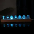 Galaxy crystal ball night light with wooden LED base displaying seven cosmic designs - Universe Theme Set (7 Balls) / Base 31x5.8x2.4cm Ball 40mm