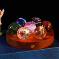 Exquisite set of seven colorful galaxy glass spheres with a circular wooden LED light base - Beech Wood / Round Base