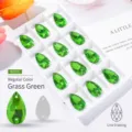 Grasgrüne Tropfen-Glas-Aufnähsteine mit Doppellöchern für DIY-Schmuck-Bastelarbeiten - 7*12mm 72 Stk./Packung / Grasgrün