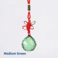 Faceted medium green crystal ball pendant with decorative red braided hanging cord - 20mm / Green
