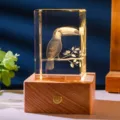 3D laser engraved crystal toucan night light on a solid wooden LED base for desktop decor. - Toucan (Style 3) / Rechargeable Multi-color Crystal Base