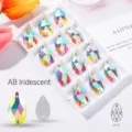 Irisierende AB-Tropfenglas-Aufnähsteine mit zwei Löchern für kreative DIY-Modearbeiten - 11 * 18mm 28 PCs/bag / AB-Farbe