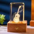 3D laser-etched crystal cube night light with guitar design on a warm wooden LED base - Guitar (Style 10) / Rechargeable Multi-color Crystal Base
