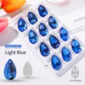 Hellblaue tropfenförmige Glassteine zum Aufnähen mit zwei Löchern für DIY-Handwerk - 10*14mm 36 Stk./Packung / Hellblau