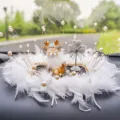 Elegant car dashboard ornament featuring a cute deer figurine with white feathers and pearls. - Feather Naughty Deer / Feather Anti-Slip Mat + Artificial Pearl Decoration + Silver Diamond Heart