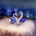 Elegant blue and clear crystal swan car ornament in a heart-shaped design with fluffy feathers - Blue Swan with Feather and Anti-slip Mat / Blue