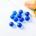 Gruppe von polierten, lichtdurchlässigen blauen Glaskugeln für Kinderspiele und Deko - 10 Stück Packung / Dunkelblau