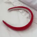 Close-up of vibrant red leather padded headband with high top French design style - Red