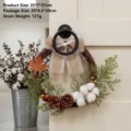 Rustic Christmas grapevine wreath with cotton bolls and pinecones hanging on a white door - Maple Leaf Cotton Style (P2-21)