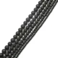 Close-up of black porous lava stone round beads in various sizes for DIY jewelry - 4mm (Approx 85pcs/Strand) / Black