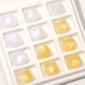 UV light reactive color-changing cat head resin beads for DIY jewelry making kits - 1 Piece / White to Yellow (Cheese Cream Yellow)