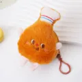 Primo piano di un simpatico portamonete in peluche a forma di coscia di pollo - Forma a coscia di pollo / Coscia di pollo
