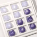UV color-changing cat head resin beads in shades of purple for DIY jewelry making. - White to Purple (Grape Aurora)