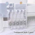 Juego de 5 mini cintas correctoras trasparentes en una bolsa de almacenamiento con cremallera - Transparente