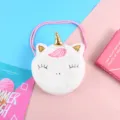 Borsa a tracolla unicorno in peluche bianca con cinturino rosa e corno dorato per bambine. - Bianco