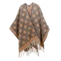 Cálido poncho de hilo bouclé grueso con un elegante patrón de lunares beige y flecos. - Café Caramelo