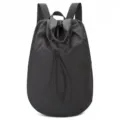 Minimalist black nylon drawstring backpack with top handles for travel and casual use - One Size / Dark Gray