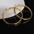 Trendy large polished gold geometric hoop earrings with a secure hinged clasp closure - Polished Hoop Style (E3782) / 4cm / Gold