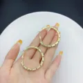 Golden hoop earrings with rectangular clear crystals in a trendy geometric design - Zirconia Hoop Style (E2427) / 4cm / Gold