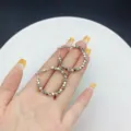 Silver-toned geometric cube beaded hoop earrings shown on a hand for scale and detail - Geometric Bead Hoop Style (E2459) / 3.3cm / Silver