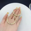 Elegant large gold-toned hoop earrings with rectangular inlaid stones for a luxury look - Baguette Rhinestone Hoop Style (E2764) / 4.50cm / Gold