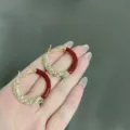 Glamorous gold hoop earrings featuring vibrant red enamel and sparkling clear rhinestones - Enamel Rhinestone Hoop Style (E3721) / 3.4cm / Red Gold