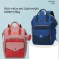 Moderna mochila de lona para mamá con diseño acolchado y bolsa de accesorios incluida - Rosa