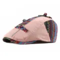 Ethnic style women's newsboy cap featuring pink fabric and colorful woven patterns - 56-59cm (Adjustable) / Toggle Style / Pink