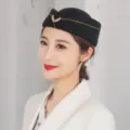 Elegant black flight attendant beret hat with golden wing emblem for professional uniforms - One Size (Fits 55-57cm Head Circumference) / Black