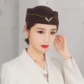 Elegant brown stewardess pillbox hat with gold emblem for uniform and performance use - One Size (Fits 55-57cm Head Circumference) / Coffee