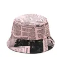 Pink bucket hat with vintage black newspaper graffiti print design - Adjustable (56-60cm) / Pink