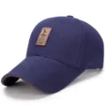 Cappellino da baseball in cotone blu navy con toppa in pelle EDIKO e bordo marrone - Cotton-navy blue / Regolabile (Adatto per circonferenza testa 56-60cm)