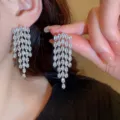 Elegant silver-toned marquise-cut cubic zirconia stone tassel earrings in waterfall design - E4302 Marquise (5.8cm) / Silver