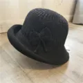 Elegant black knitted bucket hat for women with a side bow decoration, winter style - One Size (55-58cm) / 文艺蝴蝶结款式(L0192) / Black
