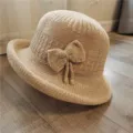 Elegant beige knit bucket hat for women with bow detail for autumn and winter wear. - One Size (55-58cm) / 文艺蝴蝶结款式(L0192) / Off White