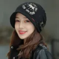Stylish black brimmed beanie hat for women with golden crown print and English text - One Size (Stretchy) / Black (Crown Print)