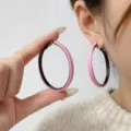 Large pink and black color-block hoop earrings with a minimalist geometric design - Pink