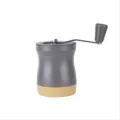 Compact grey and gold manual pill grinder for efficiently crushing vitamins or medication - Gray