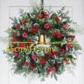 Detailed view of 45cm Christmas wreath with red berries, roses, and central golden bell. - Small Rose Large Bell (A-2293) / 45cm/17.71in