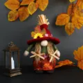 Autumn harvest festival gnome doll with red leaf hat and sunflower desktop decoration - Red Hat Braids