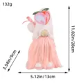 Plush gnome doll with cute peach hat embroidery and pink beard for holiday home decor. - Summer Peach Doll Style