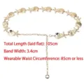 Elegant gold metal chain belt featuring starfish and seashell charms for dresses - Gold
