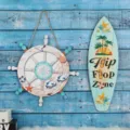Wooden surfboard and steering wheel wall hanging nautical beach home decor items - Round