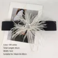 Elegant black elastic waist belt with white feather decoration and rhinestone - Off White