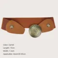 Vintage wide elastic corset belt with an ornate round bronze buckle in camel color - Camel