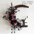 Decorative Halloween crescent moon wreath featuring a black cat silhouette and roses - Black Twig Pomegranate Style (L3-25)