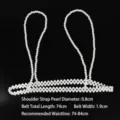 Detail of white pearl beaded harness belt with 0.8cm pearls and 1.9cm band width. - Thin White