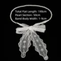 Elegant lace waist belt featuring a pearl chain and an oversized bow tie decorative detail - Style A