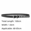 Close-up detail of black thin waist belt featuring square silver studs and sizing parameters - Square Studs (05S7443) / Length 100cm / Width 1.8cm / Black