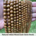 Close-up of natural yellow wood grain stone beads in various sizes for DIY jewelry. - 4mm (Approx 90pcs) / Natural Yellow Wood Grain Stone